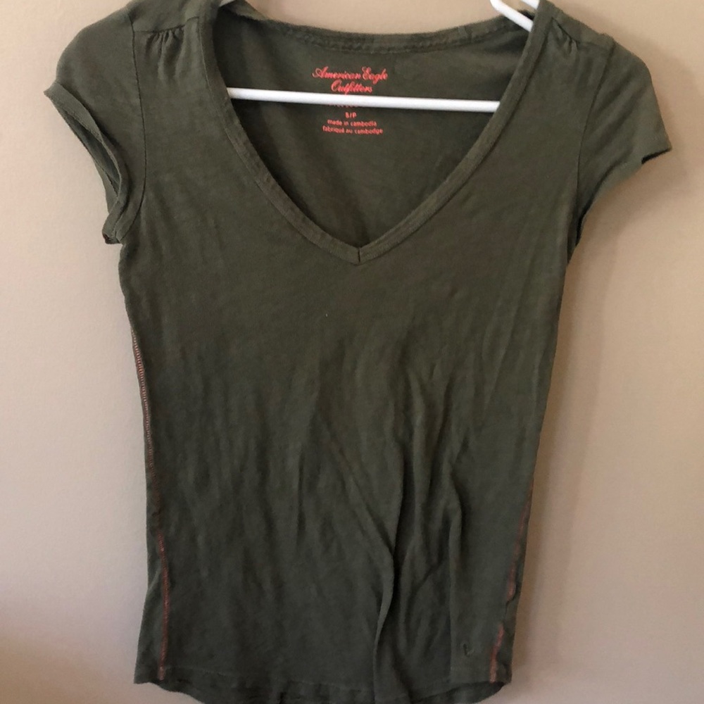 green T-shirt
